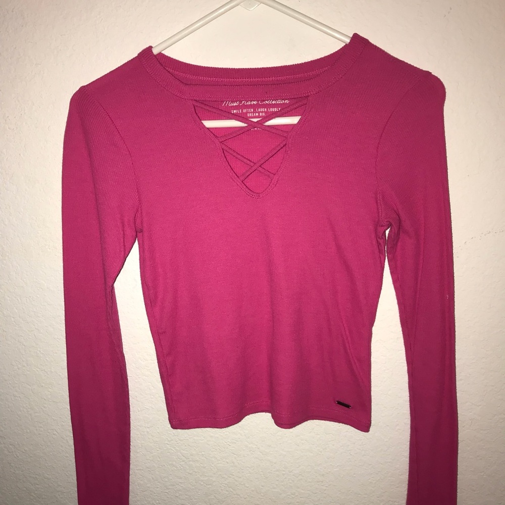 A pink long sleeve shirt